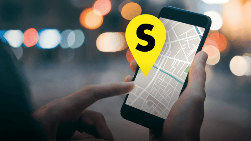 Karte auf einem Smartphone mit Starcar-Stationsfähnchen.